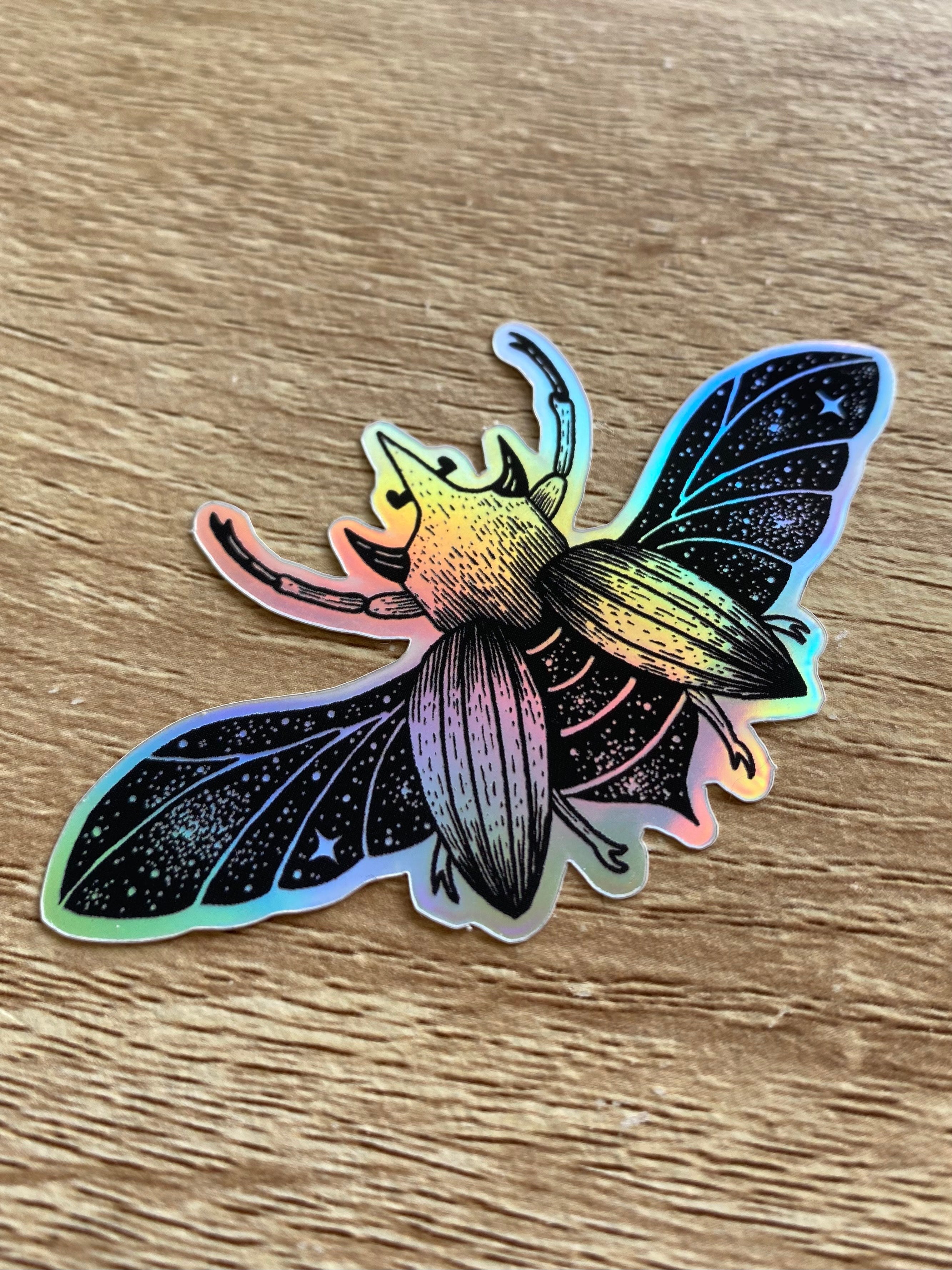 Holographic sticker "Celestial Beetle" 8.2x4.6 cm