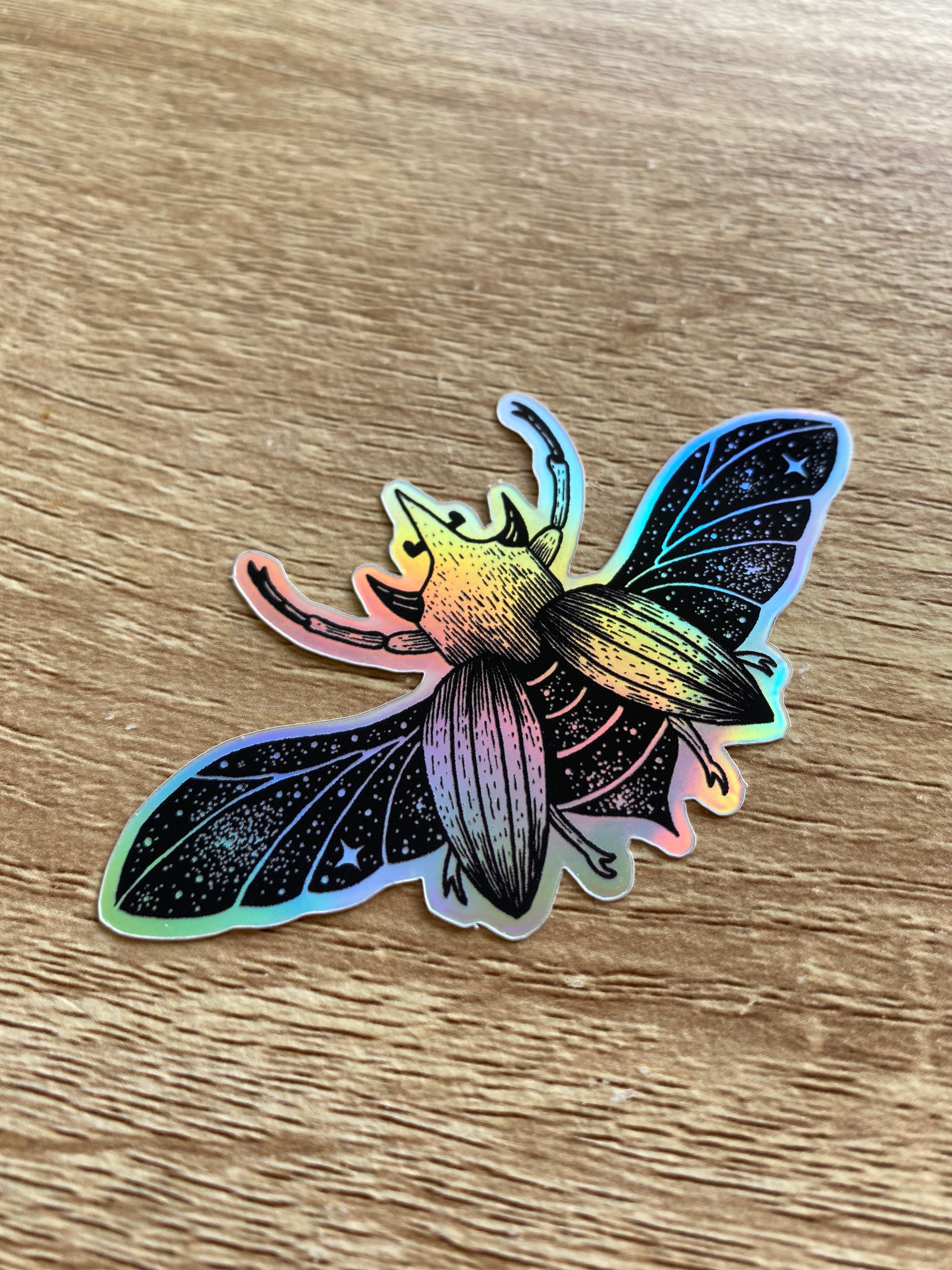 Holographic sticker "Celestial Beetle" 8.2x4.6 cm